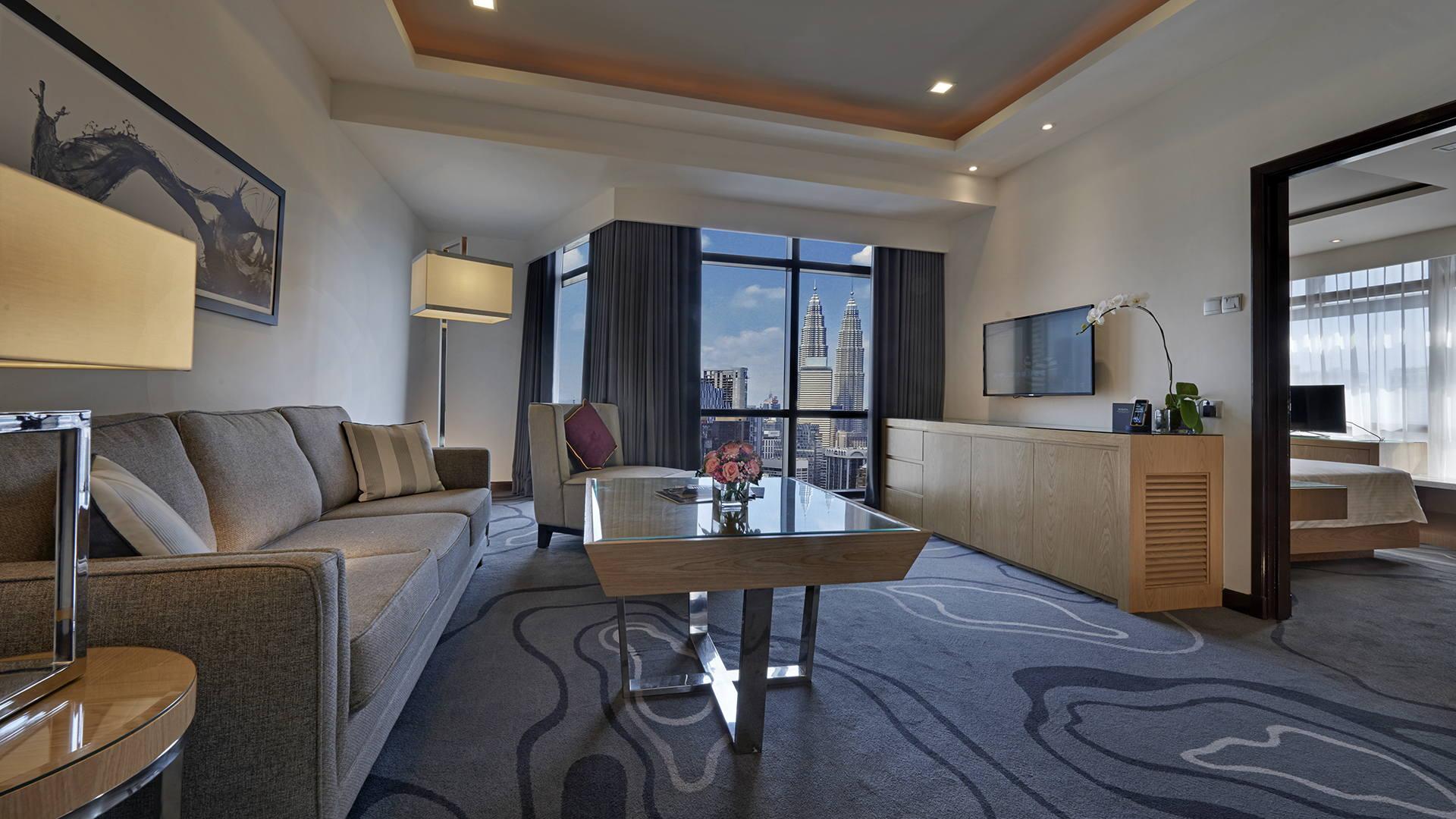 Berjaya Times Square Hotel, Куала-Лумпур Екстер'єр фото Living room of a suite